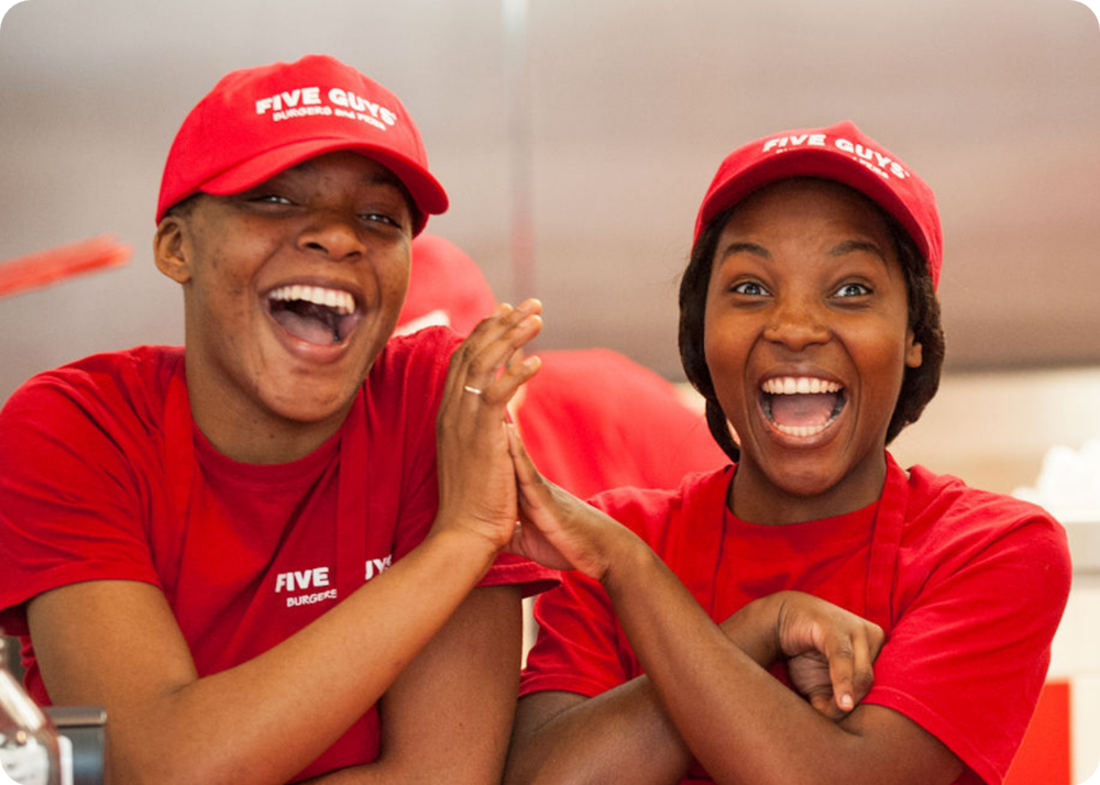 Five Guys crew member working in one of their restaurants